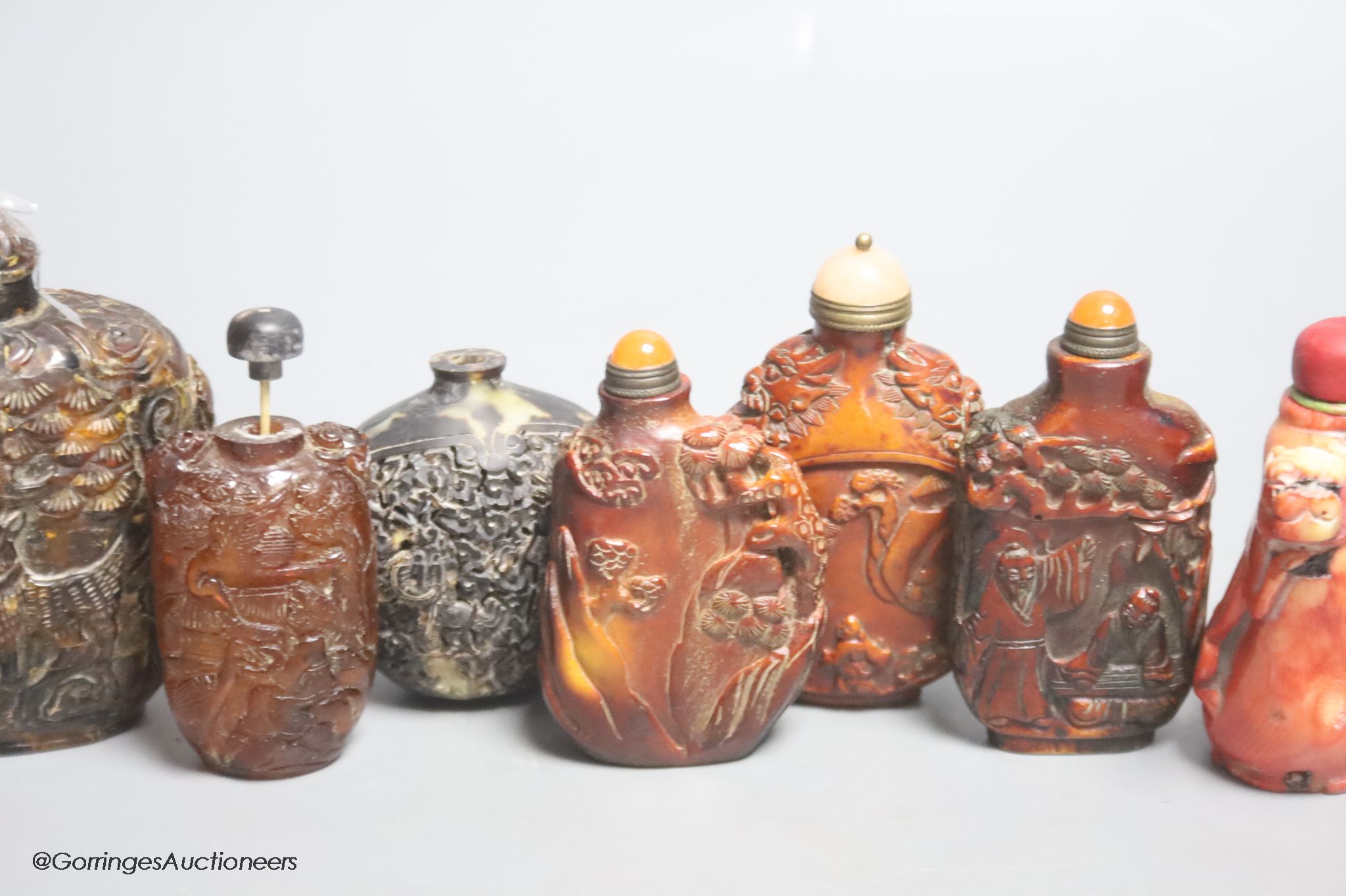 A collection of Chinese horn, tortoiseshell and coral etc. snuff bottles